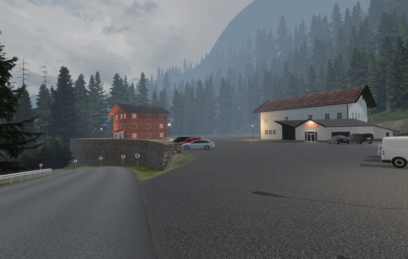 A rest stop in a mountainous region, featuring a parking area with a few cars and two buildings: a red wooden house and a white building labeled as a restaurant. Tall pine trees and mist-covered mountains dominate the background, creating a peaceful, foggy atmosphere.