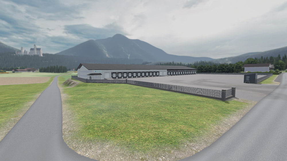 A bird's-eye view of a large distribution center with multiple loading docks and a wide parking lot. A scenic mountain range and a distant castle can be seen in the background, with roads leading to the facility through lush green fields.